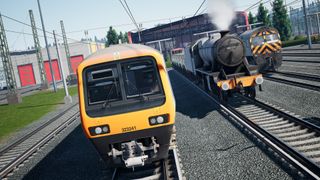 Three trains running on tracks towards the camera