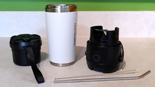 Nutribullet Flip blender with extra lid, strap, and cleaning brush