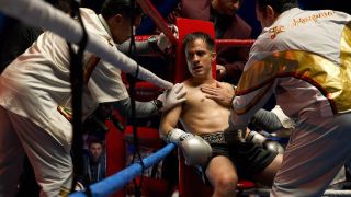 Esteban sitting in his boxing ring corner in La Maquina on Hulu