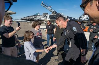 Polars Dawn commander Jared Isaacman meets with a St. Jude Family at the Sun 'n' Fun Aerospace Expo in April 2024. 