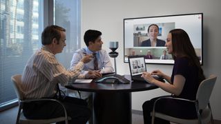 A team of people in an office.