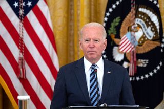 US AI Cyber Challenge: President Biden stood at a lectern in the White House