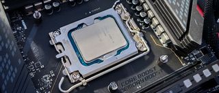 intel Alder Lake, processors on motherboard and on table