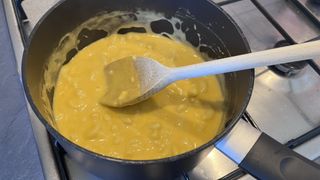 Air fryer mac and cheese balls being made by the author