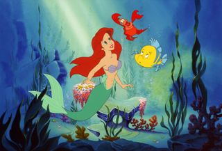 Ariel, Flounder and Sebastian in the Disney movie The Little Mermaid.