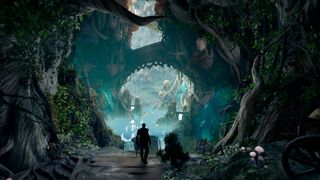 Avowed screenshot showing the lush fantasy realm called The Living Lands, with the protagonist looking at a lush cave powered by magical energy