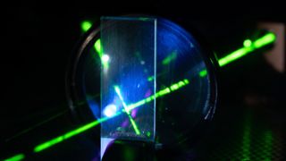 Laser experiment in photonics laboratory.