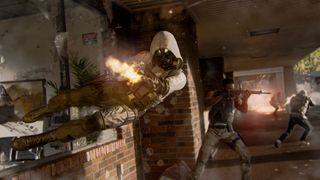 A player dives to the side, through a window, while firing a weapon