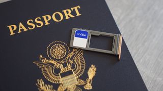 Visible SIM card sitting on top of US passport