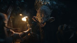 A snow troll attacks Galadriel's elven party in a Forodwaith cave in the Rings of Power