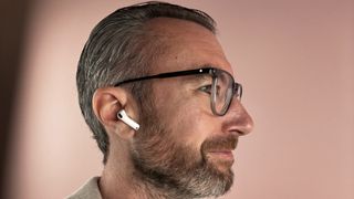 AirPods 4 worn in a man's ears