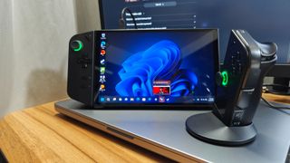 Lenovo's Legion Go gaming handheld on a MacBook laptop