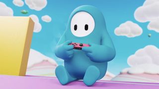 Best free games: Fall Guys screenshot of a blue character holding a Nintendo Switch JoyCon controller