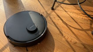 Yeedi C12 Pro Plus robot vacuum sucking up breakfast cereal