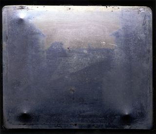 World's oldest photo shot in 1826 by Joseph Nicephore Niépce outside a window of his estate at Saint-Loup-de-Varennes, France.