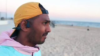 Shokz OpenRun bone conduction earphones worn