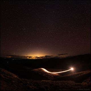 Astrophotographer Babak Tafreshi took this photo, which shows the Las Vegas lights from a long distance away. "In a pitch black starry night of Death Valley National Park, a car is driving downhill from a mountain vista looking towards [the] east. The yellow glow on the horizon resembles sunrise but it is Las Vegas at midnight, from 90 miles (145 km) away! ⁣Inside cities with so much light, you are enveloped in the artificial skyglow where [the] natural night environment is gone," Tafreshi wrote in an image description on his website. "Light pollution, unlike many other forms of pollution, is completely reversible. Each one of us can make a difference," he added.