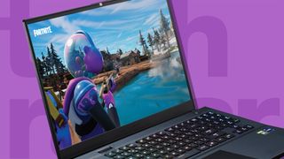 A gaming laptop playing Fortnite against a pink background