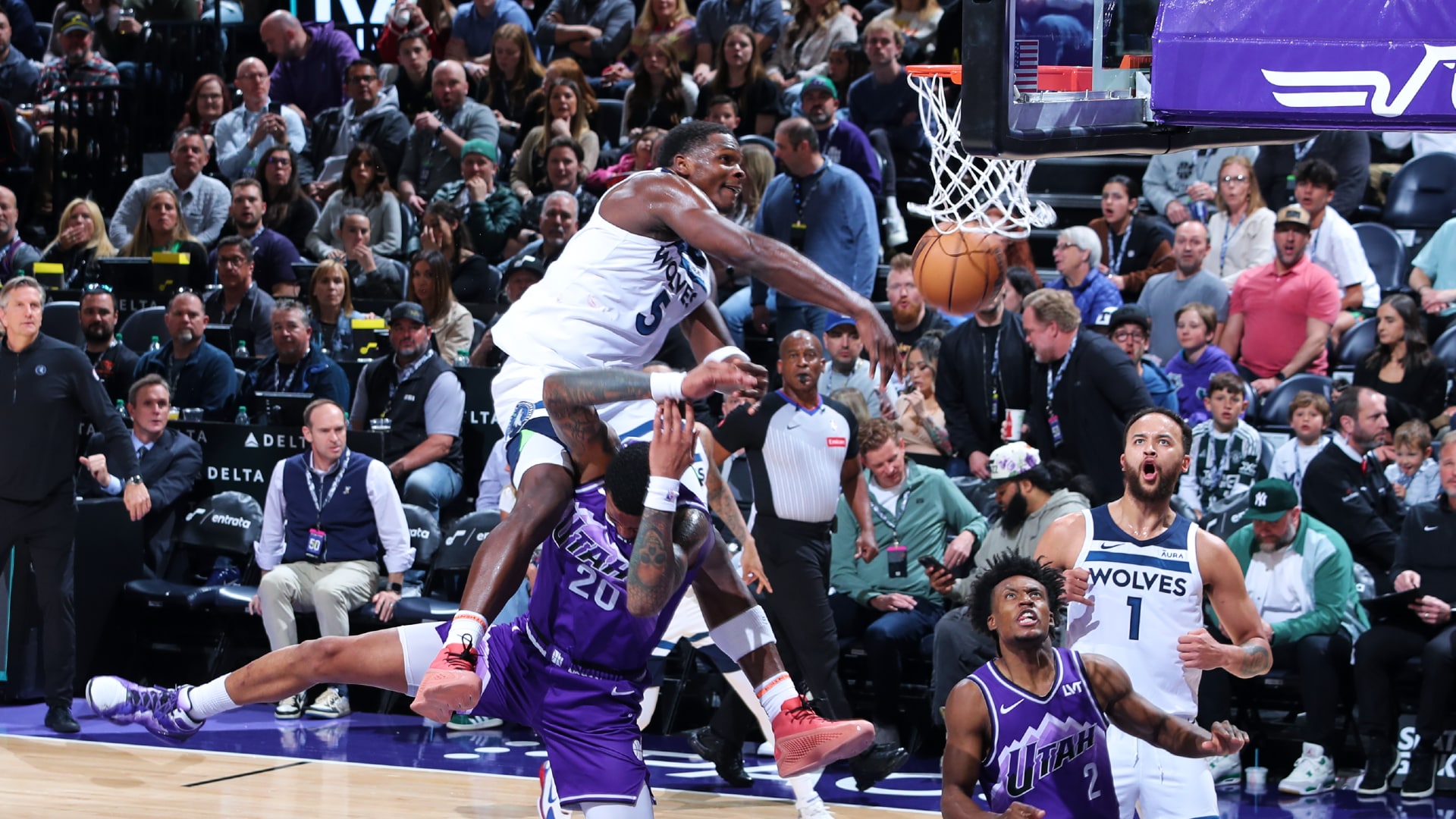 Anthony Edwards throws down viral dunk over John Collins in Wolves' win