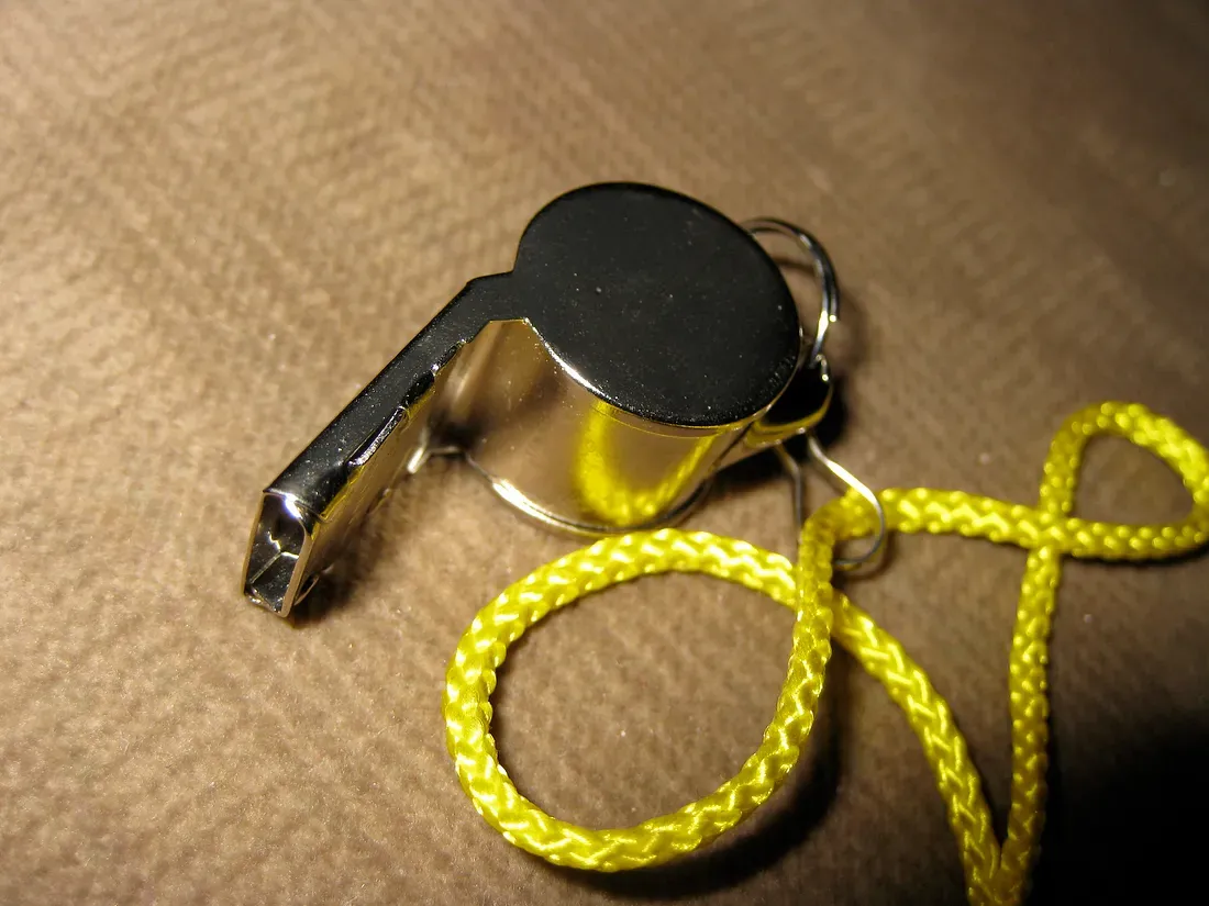 A whistle on a table.