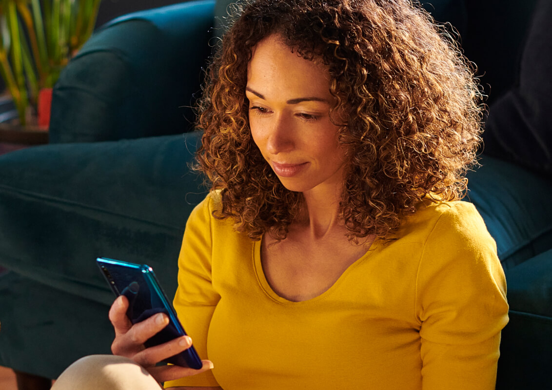 A woman seeing her phone