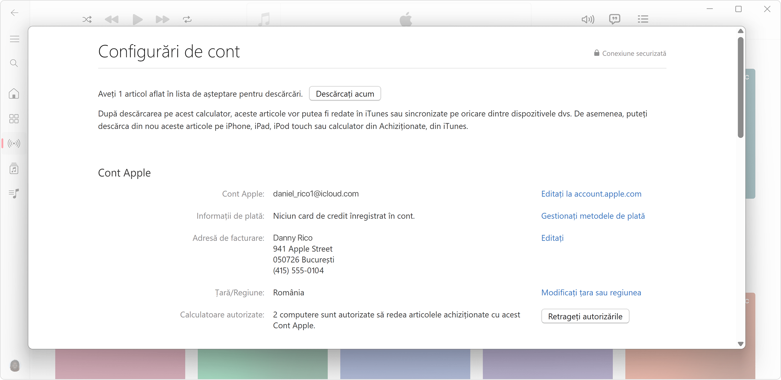 Aplicația Apple Music pentru PC cu Windows care afișează pagina Informații cont și câte computere sunt autorizate