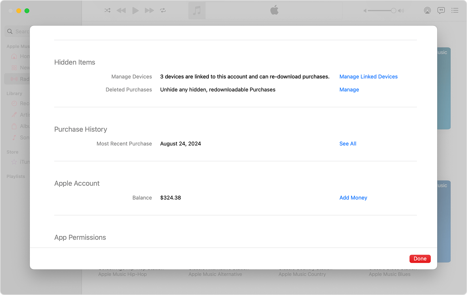 Music app on Mac showing Account Settings and the option to Manage Linked Devices.