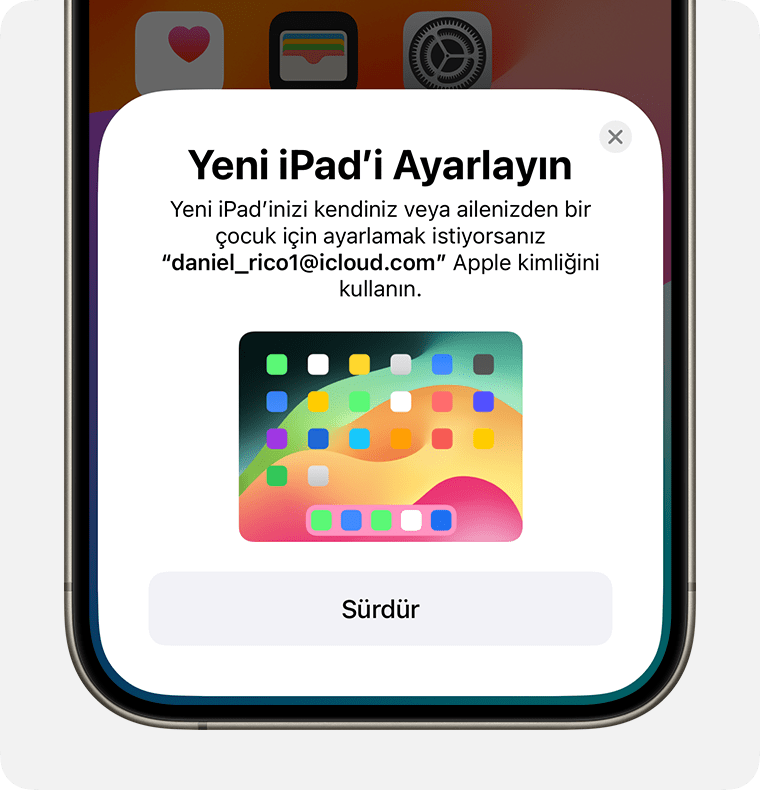 iPhone ekranınızın alt kısmında Yeni iPad'i Ayarlayın seçeneği görüntülenir.