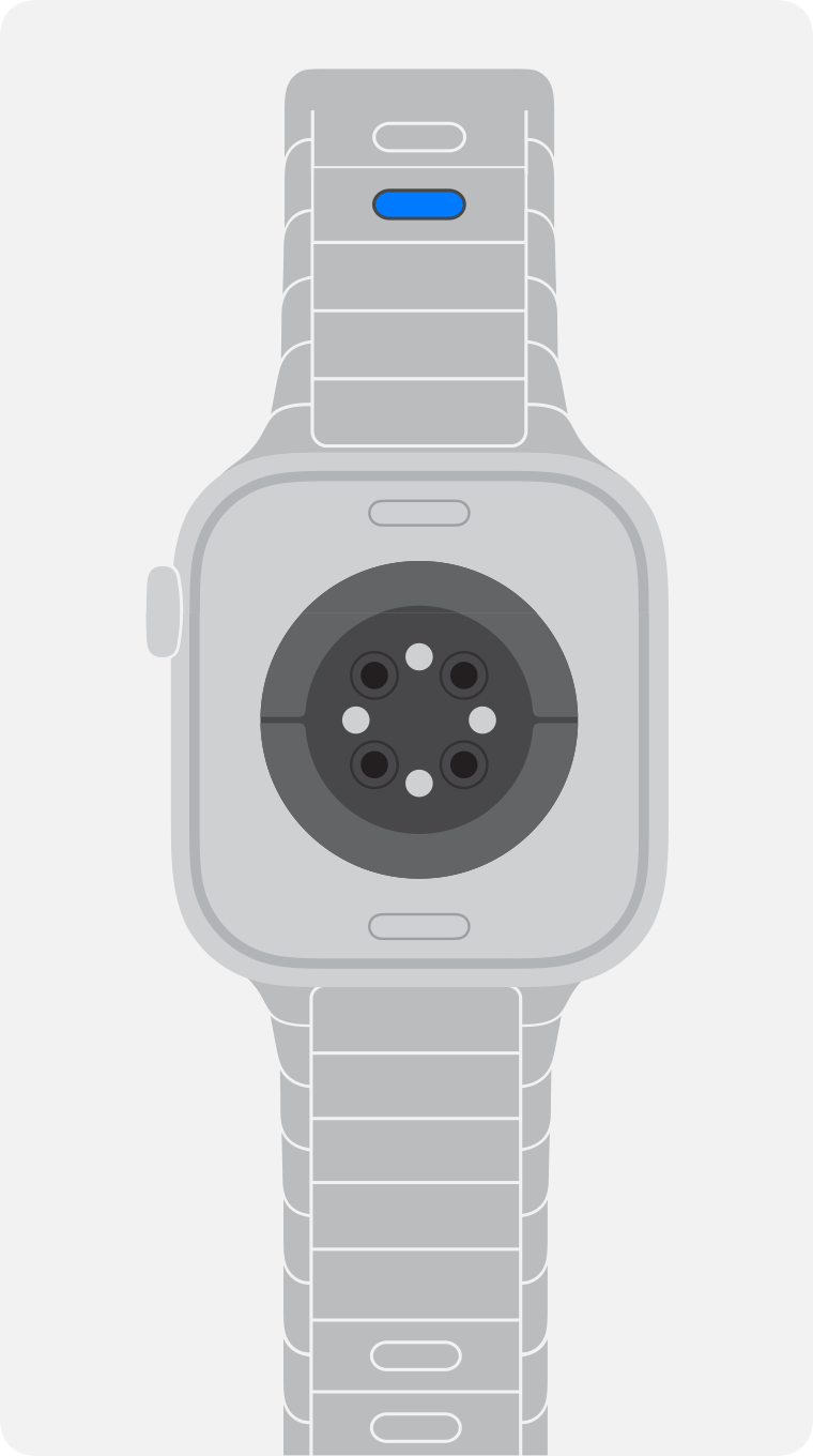 Apple Watch showing the quick release button on the bracelet