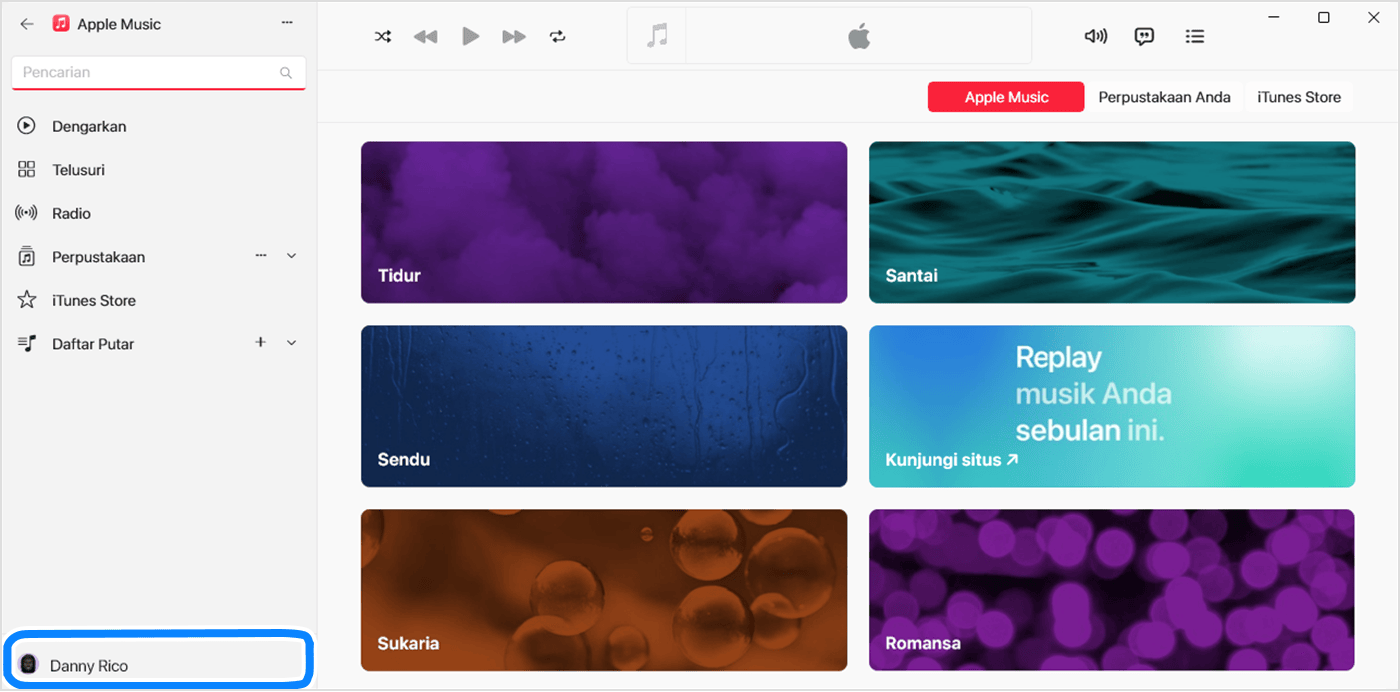 App Apple Music untuk Windows menampilkan nama pengguna yang dipilih di bagian bawah bar samping.