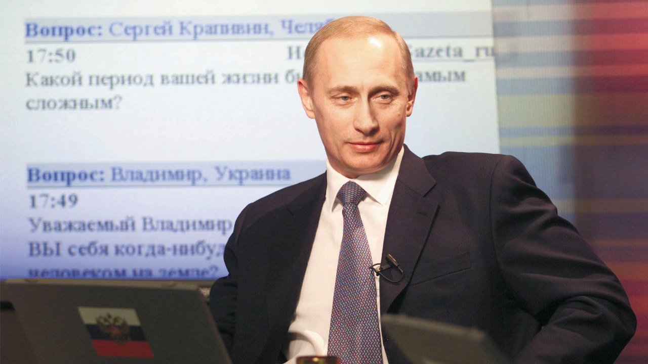 Photo: Russian President Vladimir Putin sits in front of a laptop computer during an online interview in Moscow, March 6, 2001. Putin answered questions live on the internet on Tuesday in an unprecedented webcast from the Kremlin, and said he would protect democracy and market reforms in the country. Credit: CVI/CRB