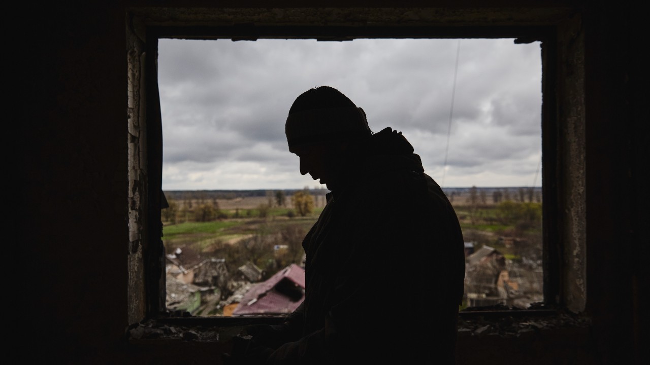 Photo: A man inspects his apartment, which was damaged by fire due to the shelling of Borodyanka, Kyiv region. Credit: Oleg Pereverzev/NurPhoto