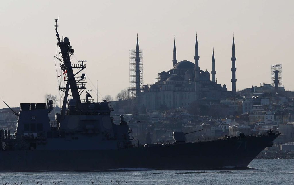 Photo: US Navy guided-missile destroyer USS Ross, with the Blue Mosque in the background, sails in the Bosphorus, on its way to the Black Sea, in Istanbul, Turkey, February 23, 2020. Credit: REUTERS/Murad Sezer