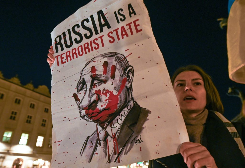 Photo: Ukrainians people living in Krakow and their supporters protesting in Krakow's Main Square, on the 229th day of the Russian invasion of Ukraine. On Thursday, October 10, 2022, in Krakow, Lesser Poland Voivodeship, Poland. Credit: Artur Widak/NurPhoto