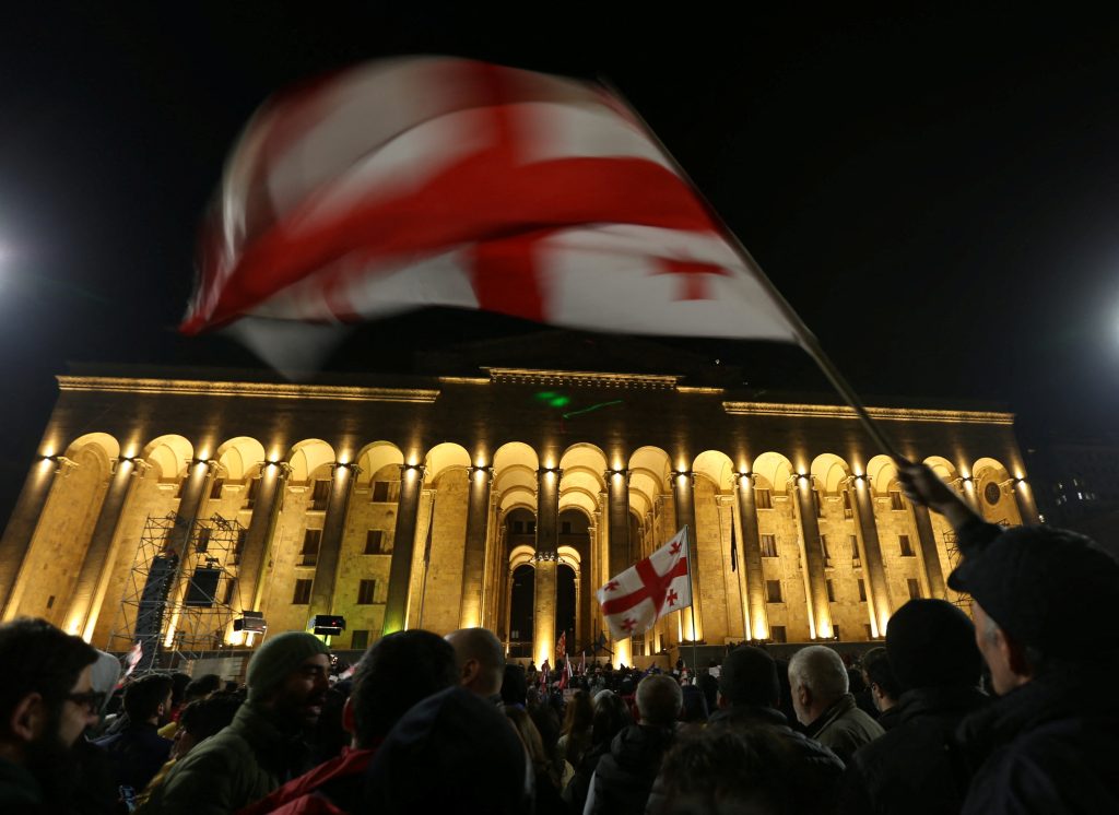 Photo: People take part in a protest demanding the government formally denounce the "foreign agents" bill, outside the parliament building in Tbilisi, Georgia March 9, 2023. Credit: REUTERS/Irakli Gedenidze