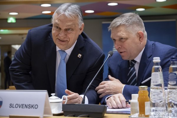 Photo: Prime Minister of Hungary Viktor Orban talks with Prime Minister of Slovakia Robert Fico before the round table session on the second of the European Council summit at the EU headquarters. Leaders discussed during the meeting Russia's aggression against Ukraine and the Middle East conflict situation while they focused also on security and defense, emphasizing in Europe's need to enhance overall readiness. The bloc discussions span military support for Ukraine, external relations, migration, agriculture, regional conflicts, EU enlargement process. The day marked the celebration for the 30th anniversary of the EEA European Economic Area of the 30 countries participating. EUCO in Brussels, Belgium on March 22, 2024 Credit: Nicolas Economou/NurPhoto