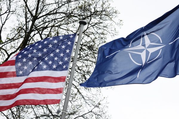 Photo: American and NATO flags are seen in Warsaw, Poland on April 12, 2024. Credit: Jakub Porzycki/NurPhoto