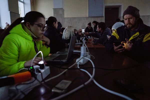 Photo: Residents charge their phones, tablets and computers in the railway station. Residents of Kherson are still overjoy about the liberation of the city, putting more than 8 months of occupation to an end. However, the southern regional capital still has no electricity, water and minimum of signal and food supply. Credit: Ashley Chan / SOPA Images/Sipa USA.