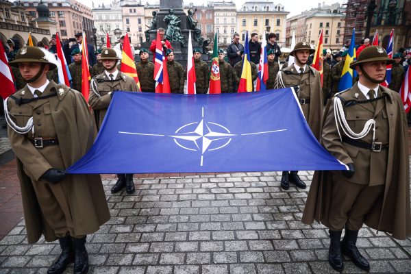 Photo: Soldiers of the Polish army are seen at the Main Square while taking part in official celebration of the 25th anniversary of Poland's accession to the structures of NATO. Krakow, Poland on March 12, 2024. Credit: Beata Zawrzel/NurPhoto