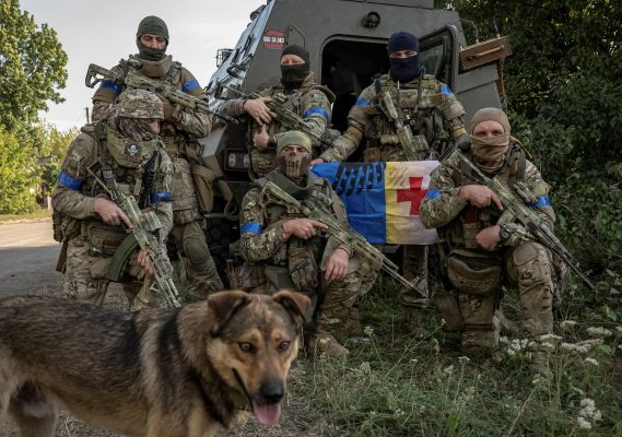 Photo: Ukrainian servicemen pose for a picture, amid Russia's attack on Ukraine, near the Russian border in Sumy region, Ukraine August 16, 2024. Credit: REUTERS/Viacheslav Ratynskyi