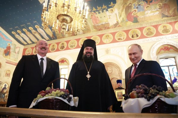 Photo: Russia's President Vladimir Putin and Azerbaijan's President Ilham Aliyev visit the Orthodox Cathedral of the Holy Myrrhbearers in Baku, Azerbaijan August 19, 2024. Credit: Sputnik/Vyacheslav Prokofyev/Pool via REUTERS