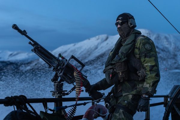 Photo: Finnish and Swedish marines practise amphibious operations with other NATO Allies in northern Norway A Swedish Marine stands on the deck of a CB-90 fast assault boat as it cuts through the water near Tovik, Norway prior to Exercise Nordic Response 24. Credit: NATO