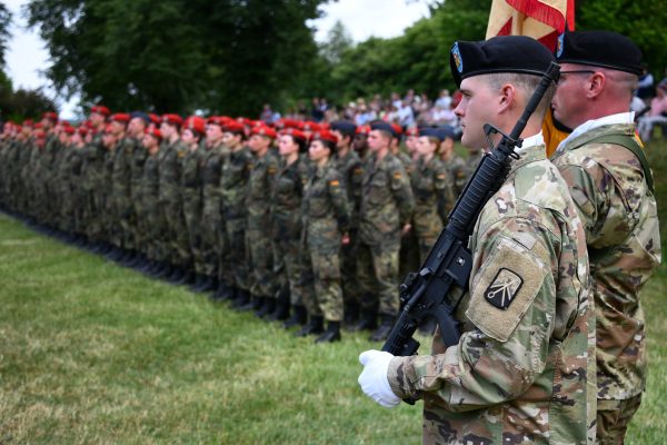 Photo: U.S. Soldiers with the 18th Combat Sustainment Support Battalion attend a German Army recruit swearing-in event and the battalion’s fifteen years partnership ceremony with the community of Freihung, Germany, June 22, 2022. Credit: U.S. Army photo by Gertrud Zach via dvids.