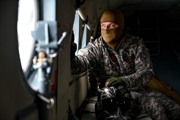 Photo: UKRAINE - JANUARY 24, 2024 - A serviceman of the 11th separate army aviation brigade "Kherson" of the Armed Forces of Ukraine looks through the helicopter window, Ukraine. Credit: (Photo by Dmytro Smolienko/Ukrinform/Sipa USA)No Use Germany.