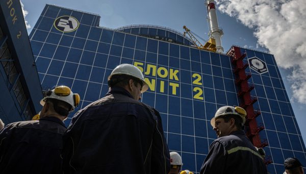 Photo: Employees stand in front of the second power unit of the Khmelnytskyi Nuclear Power Plant, amid Russia's attack on Ukraine, near the town of Netishyn, in Khmelnytskyi region, Ukraine August 7, 2024. Credit: REUTERS/Viacheslav Ratynskyi