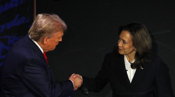 Photo: Republican presidential nominee, former US President Donald Trump and Democratic presidential nominee, US Vice President Kamala Harris shake hands as they arrive at their podiums to attend a presidential debate hosted by ABC in Philadelphia, Pennsylvania, US, September 10, 2024. Credit: REUTERS/Brian Snyder.