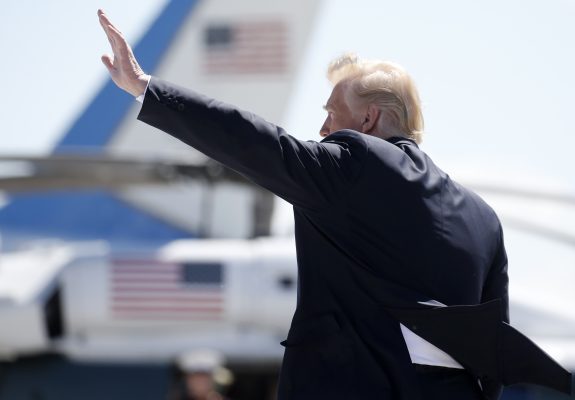 Photo: U.S. President Donald Trump waves as he arrives at Canadian Forces Base Bagotville, in La Baie, Quebec, Canada, June 8, 2018. Credit: REUTERS/Leah Millis