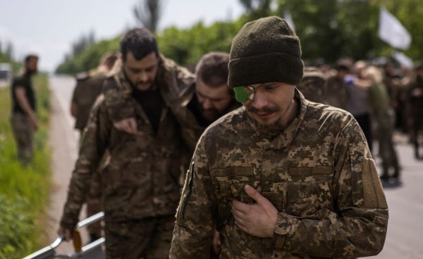 Photo: Ukrainian prisoners of war (POWs) are seen after a swap, amid Russia's attack on Ukraine, in Donetsk region, Ukraine May 25, 2023. Credit: REUTERS/Yevhenii Zavhorodnii