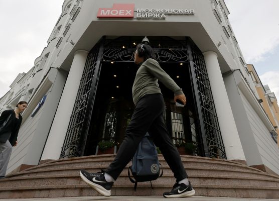 Photo: Pedestrians walk past an office of the Moscow Exchange, Russia's leading financial marketplace that ceased foreign exchange trading in dollars and euros in response to a major new round of sanctions imposed by the United States, in Moscow, Russia June 13, 2024. Credit: REUTERS/Maxim Shemetov