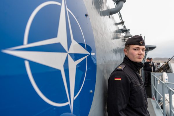 Photo: German soldier stands on warship during NATO Trident Juncture exercise. Credit: WO FRAN C.Valverde via NATO Flickr https://flic.kr/p/2ctv886